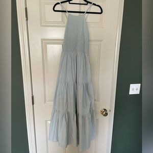 Light blue midi dress with high neckline